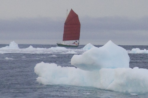 Jess sails Teleport past a bergy bits while I bob around in the blow-up dingy to take this pic