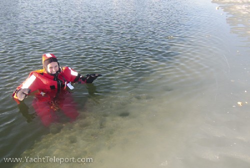 Jess about to try and climb onto the sea ice in her drysuit