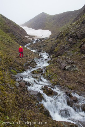 Collecting water from a glacier stream