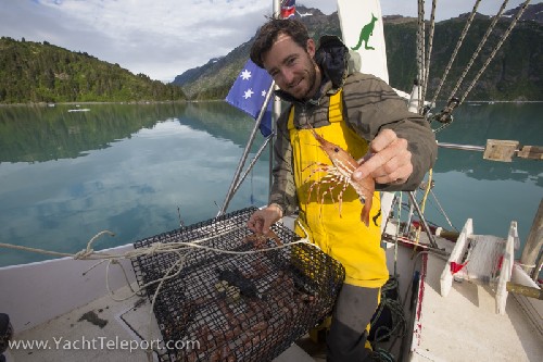 Chris with first shrimp trap haul - happy with that! - Click for full-size.