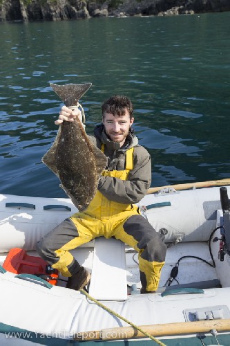 Chris with his Halibut - Click for full-size.