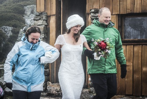 Jess\'s parents Max & Judith walking her down the isle - Click for full-size.